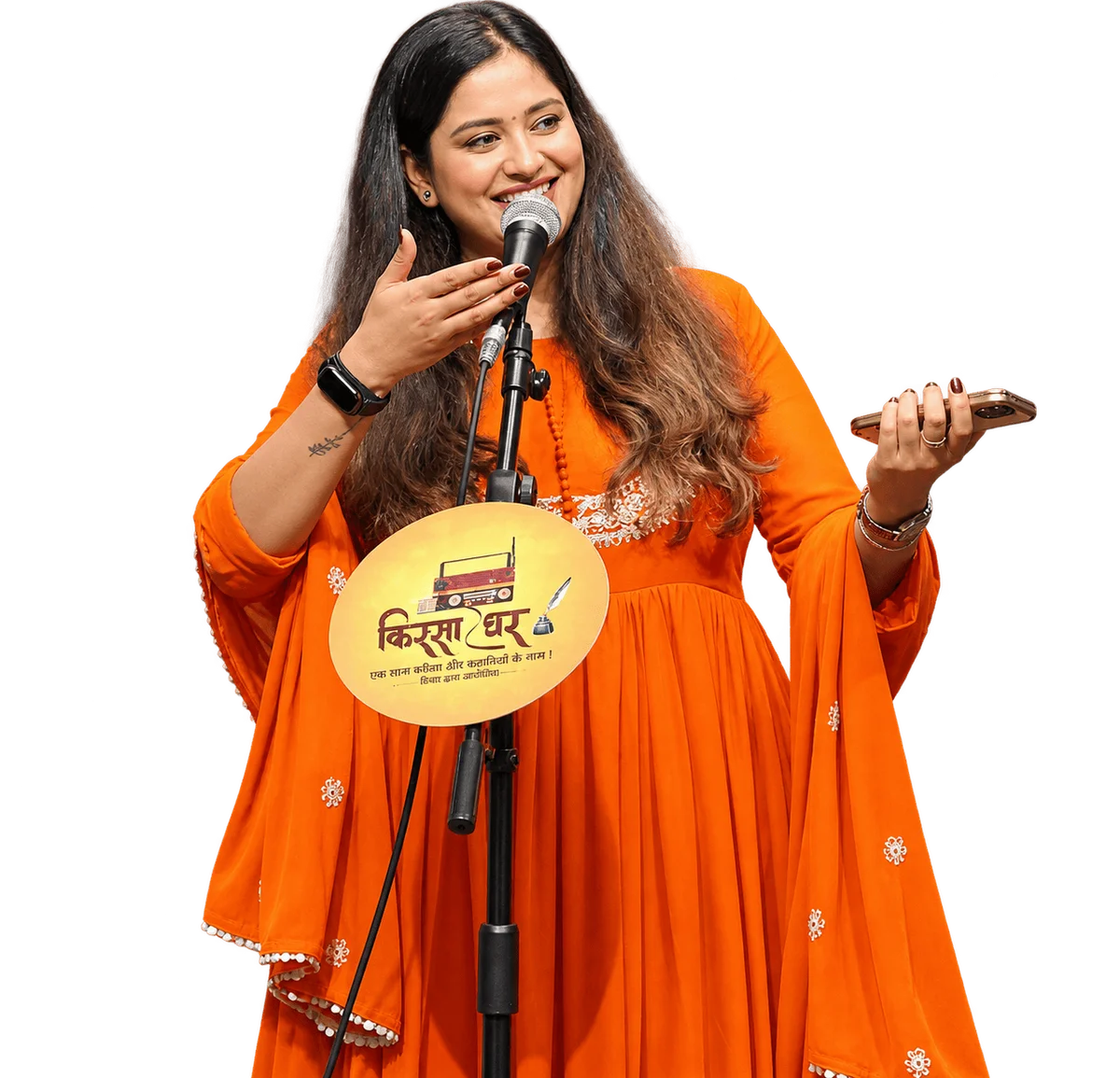A performer at Quissa Ghar, mid-performance, mic in hand